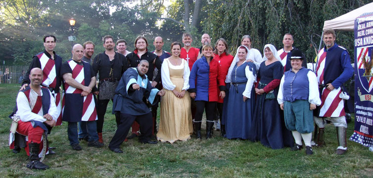 The knights, aspirants, and supporters of USA Knights of the Armored Combat League at their New York City debut at the Fort Tryon Park Medieval Fest, Sunday, September 29, 2013. Sir Zorikh Lequidre is on the extreme right. New York Knights is looking to build a team to compete in the Armored Combat League and host tournaments at events such as this.